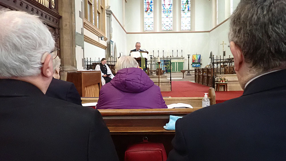 10. Our Chairman, Wayne Bramwell, reads the first lesson.