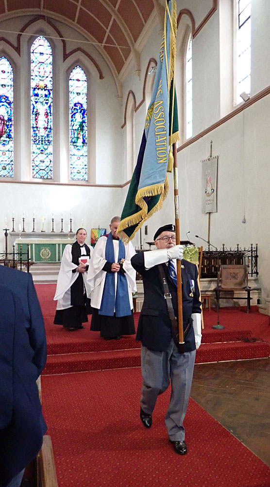 20. The end of the service and the Standard leads the clergy out.